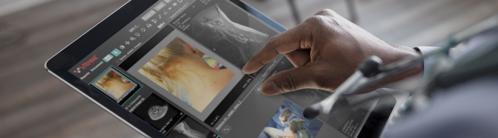 Enterprise imaging viewers intro image of a doctor using Vitrea on an iPad.